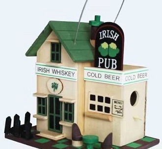 birdhouse themed as an Irish pub with cream walls and green roof